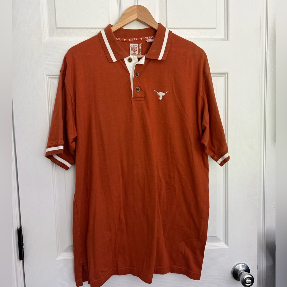 Size XL University of Texas burnt orange polo with longhorn on chest.